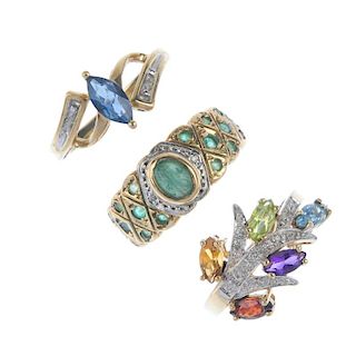 A selection of three 9ct gold diamond and gem-set rings. To include an emerald and diamond ring, a b