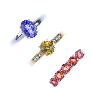 A selection of three gold gem-set rings. To include a 14ct gold tanzanite single-stone ring, a 9ct g