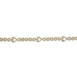 A 9ct gold bracelet. Designed as a series of brick-links, with openwork heart-shape spacers. Import
