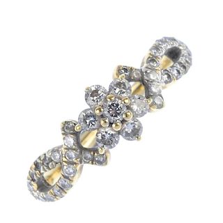 A diamond dress ring. Of openwork design, the brilliant-cut diamond floral cluster, to the similarly