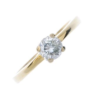 A diamond single-stone ring. The brilliant-cut diamond, to the similarly-cut diamond accent gallery