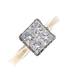An 18ct gold diamond ring. The square-shape diamond quatrefoil, within a pierced heart gallery, to t
