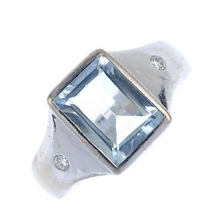 An aquamarine dress ring. The rectangular-shape aquamarine collet, with brilliant-cut diamond accent