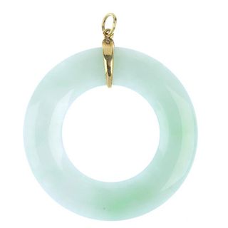 A jadeite pendant. The jadeite disc, with loop surmount. Length 6cms. <br><br> Overall condition goo