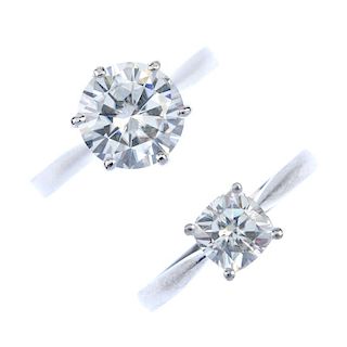 Two moissanite single-stone rings. To include a circular-shape moissanite single-stone ring, a cushi