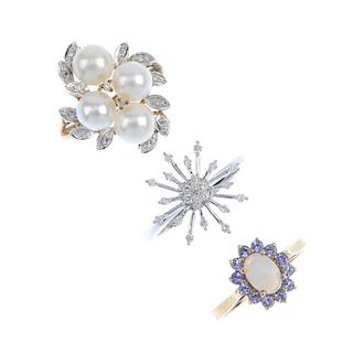 A selection of three 9ct gold gem-set rings. To include a tanzanite and opal cluster ring, a diamond