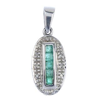 An 18ct gold emerald and diamond pendant. The calibre-cut emerald line, within a single-cut diamond