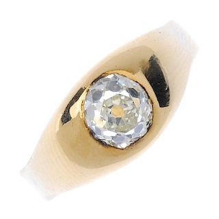 An early 20th century gold diamond single-stone ring. The old-cut diamond, inset to the tapered side