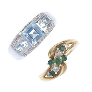 A selection of four diamond and gem-set dress rings. To include a 9ct gold emerald and diamond cross