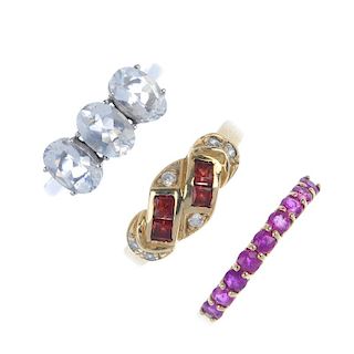 A selection of five gem-set rings. To include an Edwardian garnet and paste two-stone ring, a 9ct go
