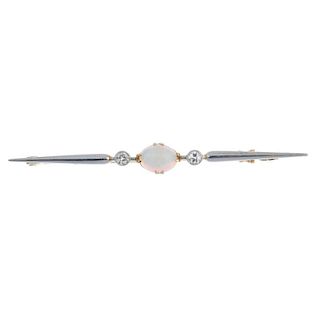 A mid 20th century diamond and opal bar brooch. The oval opal cabochon, with old-cut diamond sides,