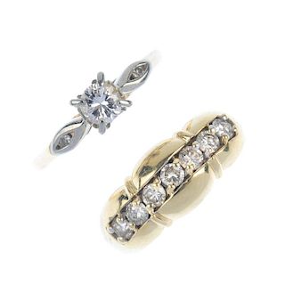 Two diamond dress rings. The first designed as a brilliant-cut diamond, with single-cut diamond shou