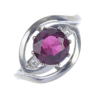 A garnet and diamond pendant and ring. To include a 9ct gold triangular-shape garnet and brilliant-c