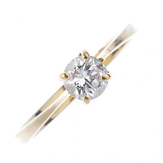 A diamond single-stone ring. The brilliant-cut diamond, to the tapered band. Estimated diamond weigh