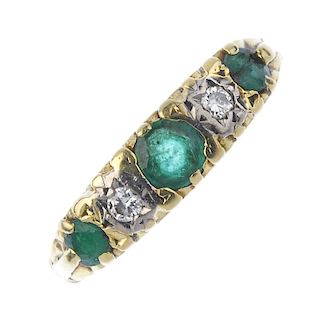 An 18ct gold emerald and diamond five-stone ring. The alternating graduated circular-shape emerald a