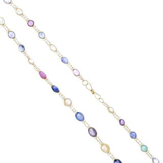 A multi-gem necklace. Designed as a series of oval and circular-shape gemstones, to include sapphire