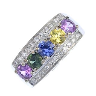 A sapphire and diamond dress ring. The circular-shape pink, yellow, green and blue sapphire line, wi