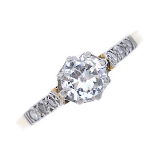 A mid 20th century 18ct gold and platinum diamond single-stone ring. The circular-cut diamond, with