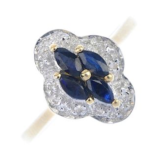 A 9ct gold sapphire and diamond dress ring. The marquise-shape sapphire quatrefoil and bead highligh