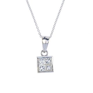 A diamond pendant. The square-shape diamond quatrefoil, suspended from a tapered surmount and 18ct g