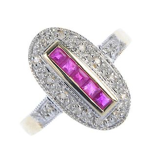 A 9ct gold ruby and diamond dress ring. The square-shape ruby line, within a single-cut diamond illu