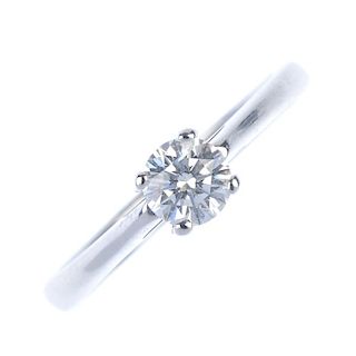 An 18ct gold diamond single-stone ring. The brilliant-cut diamond, to the tapered band, with 'one lo