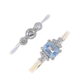 Two diamond and gem-set dress rings. To include an 18ct gold rectangular-shape blue topaz ring with