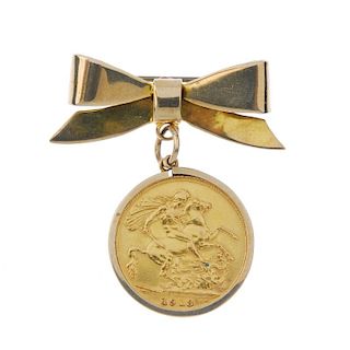 A sovereign pendant. The sovereign, dated 1913, within a 9ct gold mount, suspended from a bow surmou