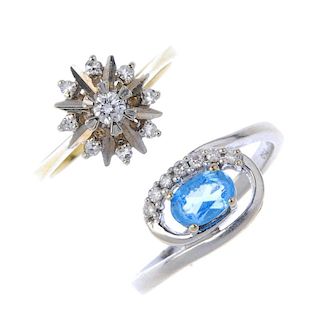Two diamond and gem-set dress rings. To include an oval-shape blue topaz and brilliant-cut diamond a