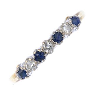 An 18ct gold diamond and sapphire half-circle eternity ring. Designed as an alternating brilliant-cu