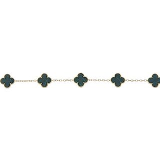 A malachite bracelet. Comprising a series of malachite crosses, spaced along a trace-link chain, to