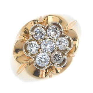 A gentleman's diamond cluster ring. The old-cut diamond, within a vari-cut diamond scalloped surroun