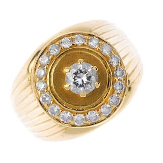 A gentleman's diamond ring. The brilliant-cut diamond, raised to the similarly-cut diamond circular