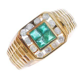 A gentleman's emerald and diamond ring. The square-shape emerald quatrefoil collet, within a brillia