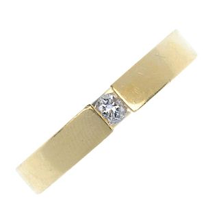 A gentleman's 18ct gold diamond single-stone ring. The brilliant-cut diamond, to the angular band. E