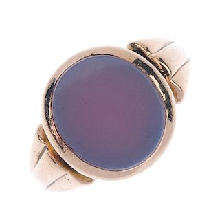 A late Victorian chalcedony signet ring. The oval-shape chalcedony, to the grooved shoulders and tap