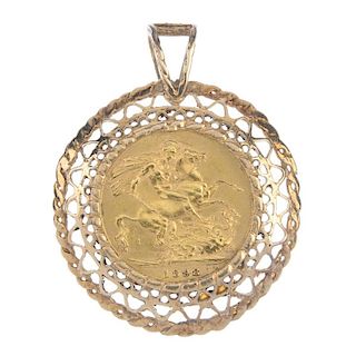 A Victorian sovereign pendant. The sovereign, dated 1898, within a 9ct gold openwork surround, to th