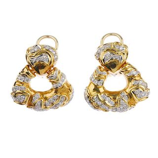 {}(117589) A pair of diamond ear pendants. Each designed as brilliant-cut diamonds within an open-wo