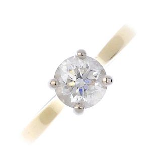 (174110) An 18ct gold diamond single-stone ring. The brilliant-cut diamond to the tapered shoulders