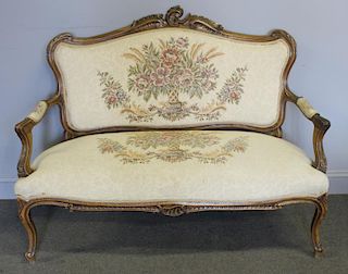 Carved Louis XV Style Upholstered Settee.