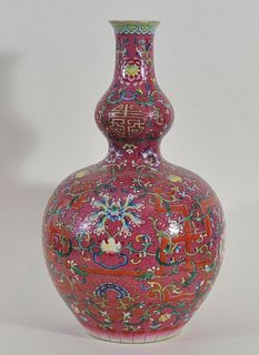 COLOURFULLY PAINTED VASE
