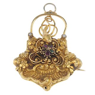 An early 19th century gold 'regard' snake locket. Of padlock design, the ruby, emerald, garnet and d