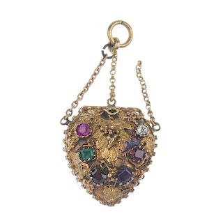 A mid 19th century gold gem-set 'regard' heart locket. The foliate and beaded casing, with overlaid