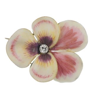 A mid 20th century diamond and enamel pansy brooch. The old-cut diamond collet, within a pink and wh