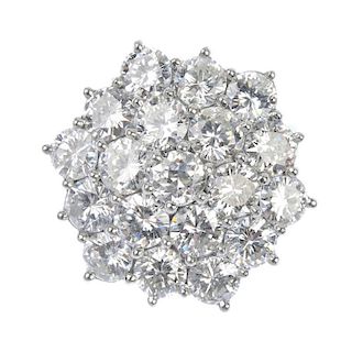 A diamond cluster ring. The brilliant-cut diamond, within a brilliant-cut diamond two-tiered border,