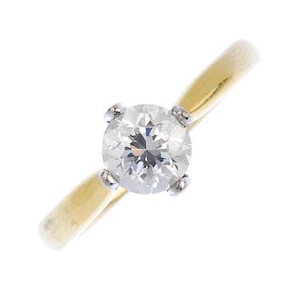 An 18ct gold diamond single-stone ring. The brilliant-cut diamond, weighing 1ct, to the tapered shou