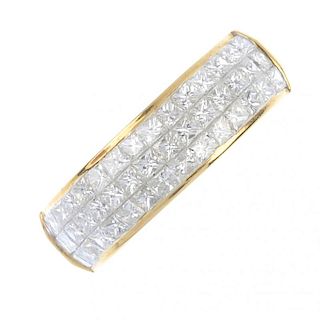 A diamond dress ring. Designed as a curved panel of square-shape diamond, to the plain band. Total d