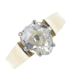 An 18ct gold diamond single-stone ring. The pear-shape old-cut diamond, weighing 1.76cts, to the tap