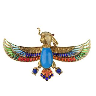 A plique-a-jour enamel and turquoise brooch. Designed as an Egyptian King, with white enamel headdre