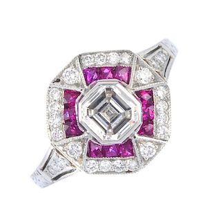 A diamond and ruby dress ring. Theoctagonal-shape diamond, within a calibre-cutruby and brilliant-cu